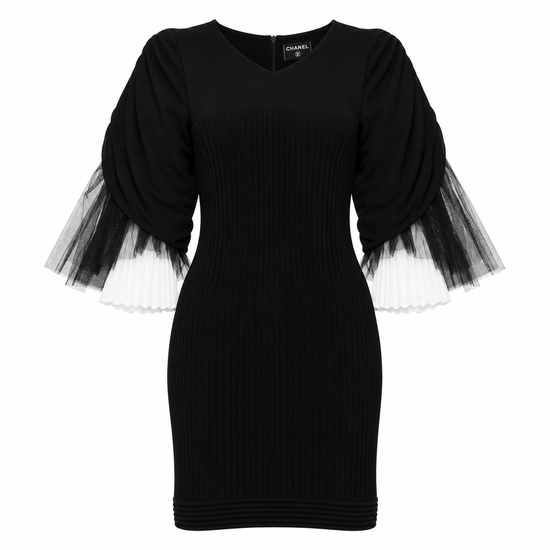 Black Chanel rib knit mini dress with tulle inset details, showcasing a stylish and elegant design perfect for special occasions.