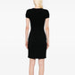 Black short-sleeve wool knit dress by Chanel, showcasing a sleek, fitted design with a classic round neckline.