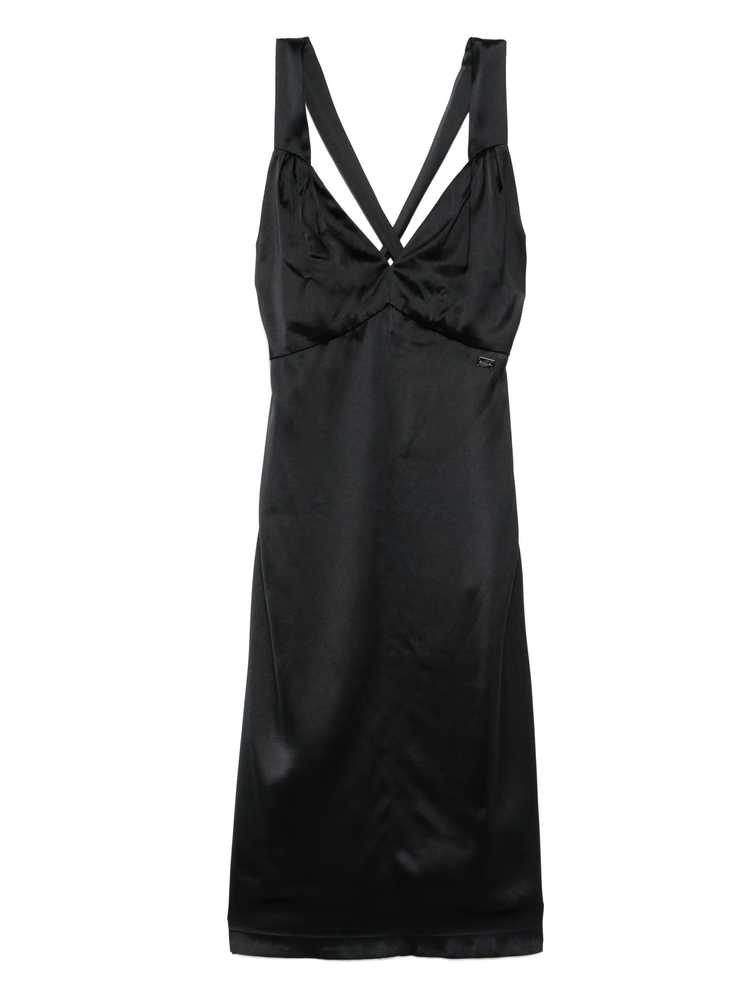 Black silk midi dress by Chanel, showcasing elegant design and smooth fabric, perfect for sophisticated occasions.