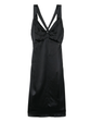 Black silk midi dress by Chanel, showcasing elegant design and smooth fabric, perfect for sophisticated occasions.
