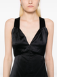 Chanel black silk midi dress with elegant design, featuring smooth fabric and a sophisticated silhouette.