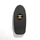 Chanel black skateboard deck with textured grip surface and large gold interlocking CC logo at the centre.