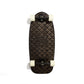 Chanel black skateboard deck with textured grip surface and large gold interlocking CC logo at the centre.
