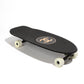 Chanel black skateboard deck with textured grip surface and large gold interlocking CC logo at the centre.