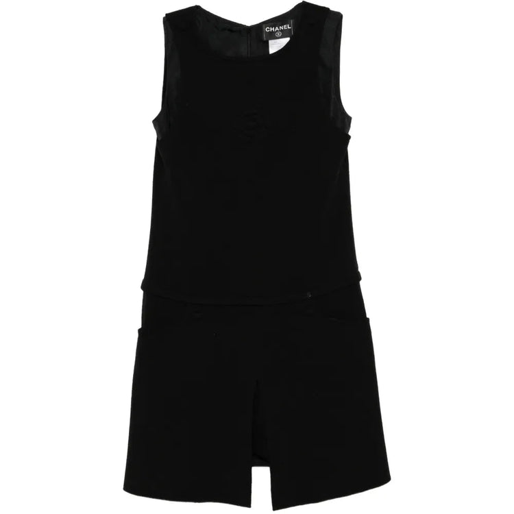 Black Chanel sleeveless wool mini dress featuring a sleek, fitted design with a high neckline and classic Chanel detailing.