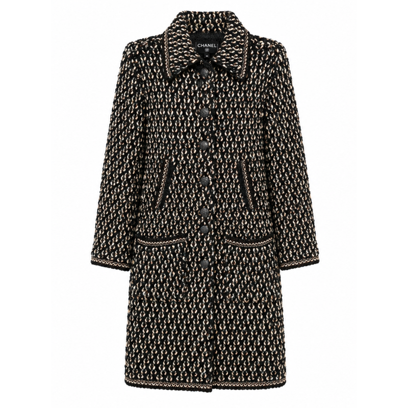 Black tweed coat by Chanel featuring textured fabric and a longline design, perfect for stylish cold-weather wear.