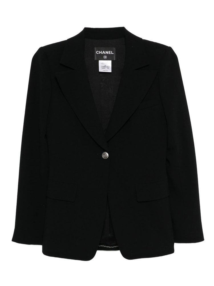 Chanel black wool blazer with tailored fit, classic collar, and button closure, stylish for formal and casual wear.