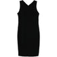 Black wool sleeveless sheath dress by Chanel, tailored fit with a sleek silhouette, perfect for elegant occasions.