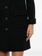 Black Chanel wool tweed coat made of classic textured fabric, stylish long coat with a tailored fit and elegant design.