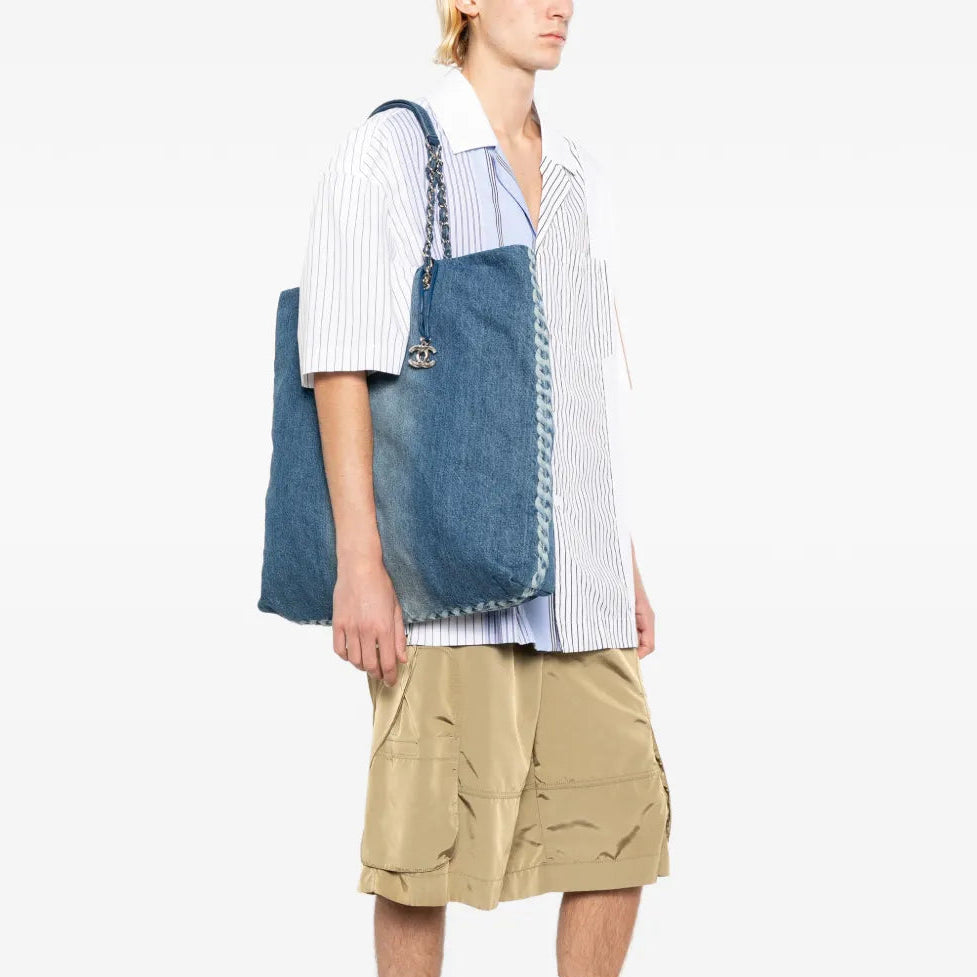Chanel denim shopper bag with top handle, casual stylish tote in blue denim fabric and classic design.