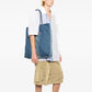 Chanel denim shopper bag with top handle, casual stylish tote in blue denim fabric and classic design.