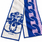 Chanel blue, ivory and violet silk scarf with polka dot print, graphic wave pattern and decorative chain and floral motif.

