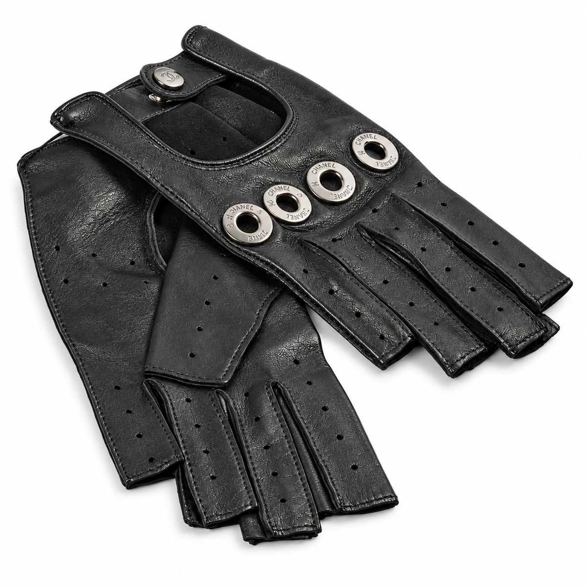 Black Chanel Lambskin Fingerless Gloves, stylish and luxurious, shown on a model demonstrating their elegant design and soft leather texture.