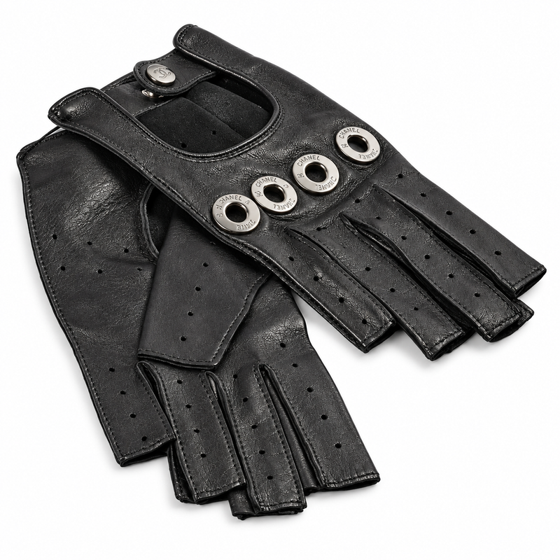 Black Chanel Lambskin Fingerless Gloves, stylish and luxurious, shown on a model demonstrating their elegant design and soft leather texture.