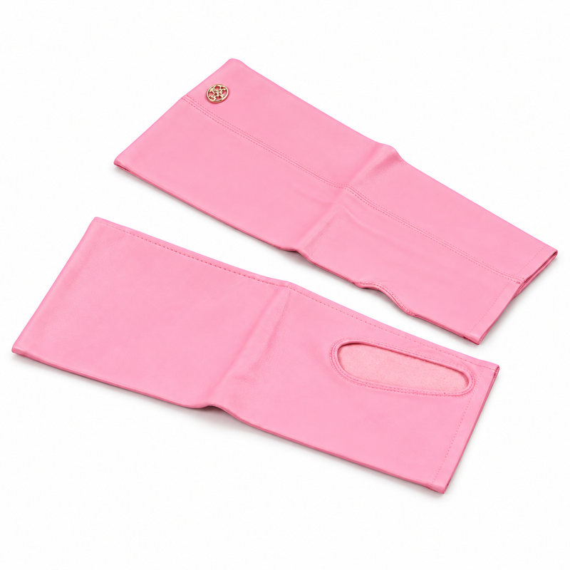 Chanel by Karl Lagerfeld Barbie pink kidskin fingerless gloves with gold-tone CC medallion, mid-length silhouette and visible signs of wear.