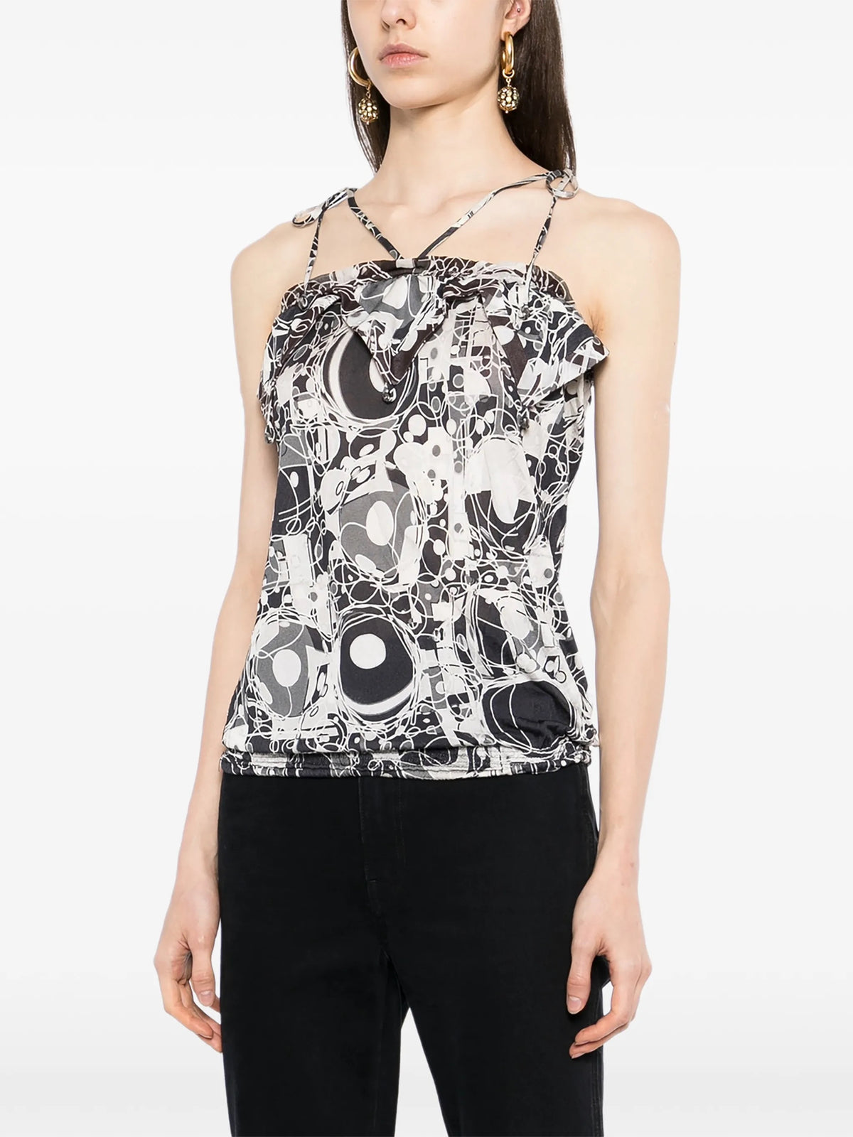 Chanel monochrome printed silk halterneck top with elegant strap design, showcased in a close-up fashion image.