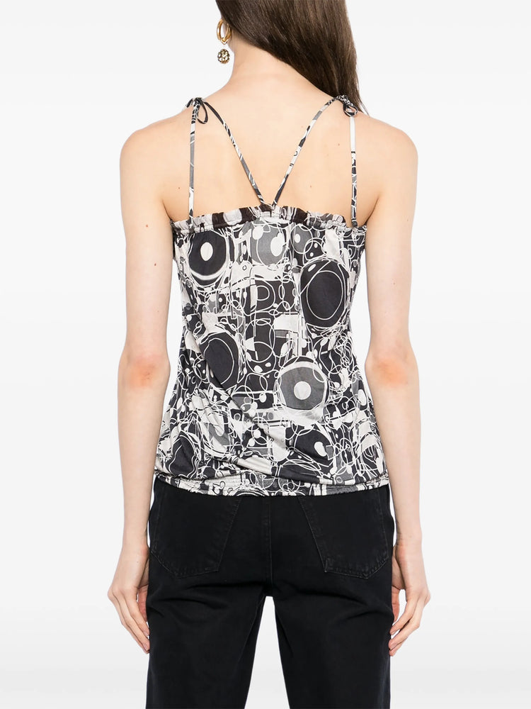 Chanel monochrome printed silk halterneck top with elegant design, showcasing smooth fabric and stylish halter neckline.