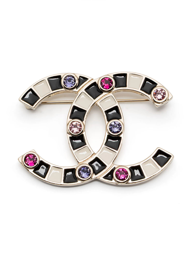 Chanel Crystal Enamel Stripe Brooch featuring colorful stripes and sparkling crystals on a metal pin back.
