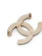 Chanel crystal enamel stripe brooch with colorful designs and gold-tone pin on a white background