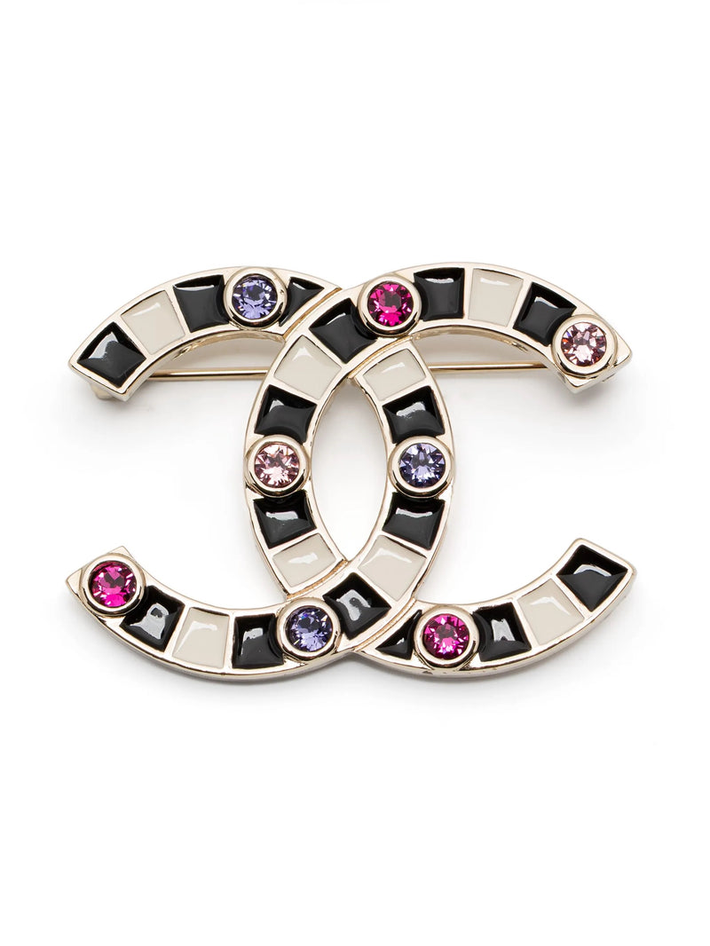 Chanel crystal enamel stripe brooch, front view showing white and black stripes