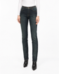 Chanel dark blue stonewashed skinny jeans with high-rise waist, slim straight silhouette, five-pocket construction and contrast brown stitching.