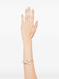 Chanel double faux pearl bangle bracelet with silver-tone setting, stylish and elegant jewelry accessory.