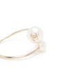 Chanel double faux pearl bangle bracelet with elegant pearl accents and sleek design, perfect for sophisticated accessories.