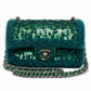 Green Chanel Tweed Braid Sequin mini rectangular flap bag with chain strap and elegant design.