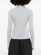 Chanel grey cashmere shirt with a detachable collar, showcasing elegant long-sleeve tops designed for sophisticated style.