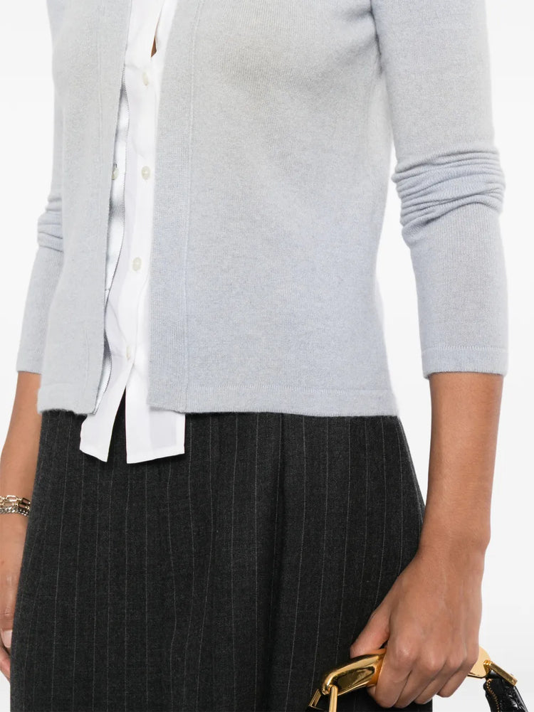 Chanel grey cashmere shirt with a detachable collar, featuring long sleeves and a classic, elegant design.