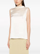 Ivory Chanel sleeveless silk satin top with mock-neck design, elegant and smooth fabric, perfect for stylish daytime or evening wear.