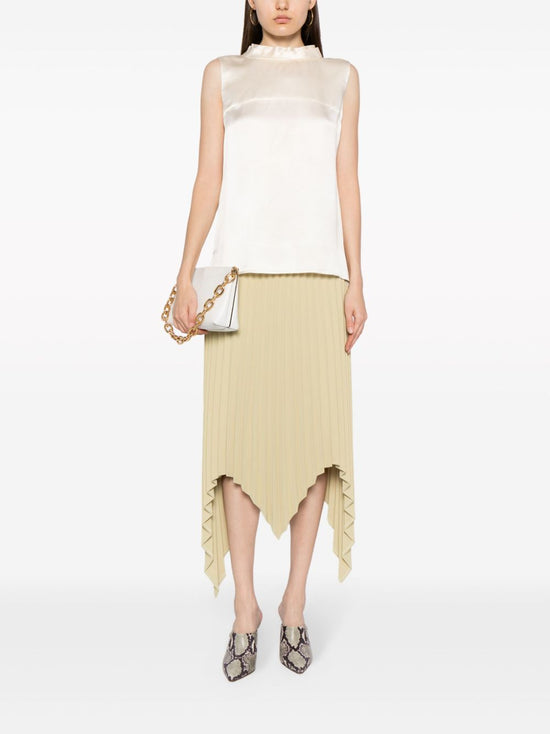 Ivory Chanel sleeveless silk satin mock-neck top displayed on a hanger, highlighting smooth fabric and elegant design.