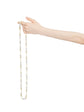 Chanel long single-strand sautoir necklace featuring a blend of champagne, silver-grey, and cream faux pearls with a metal clasp.