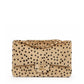 Chanel medium cheetah print flap shoulder bag with gold hardware, showcasing luxurious animal print and elegant design.