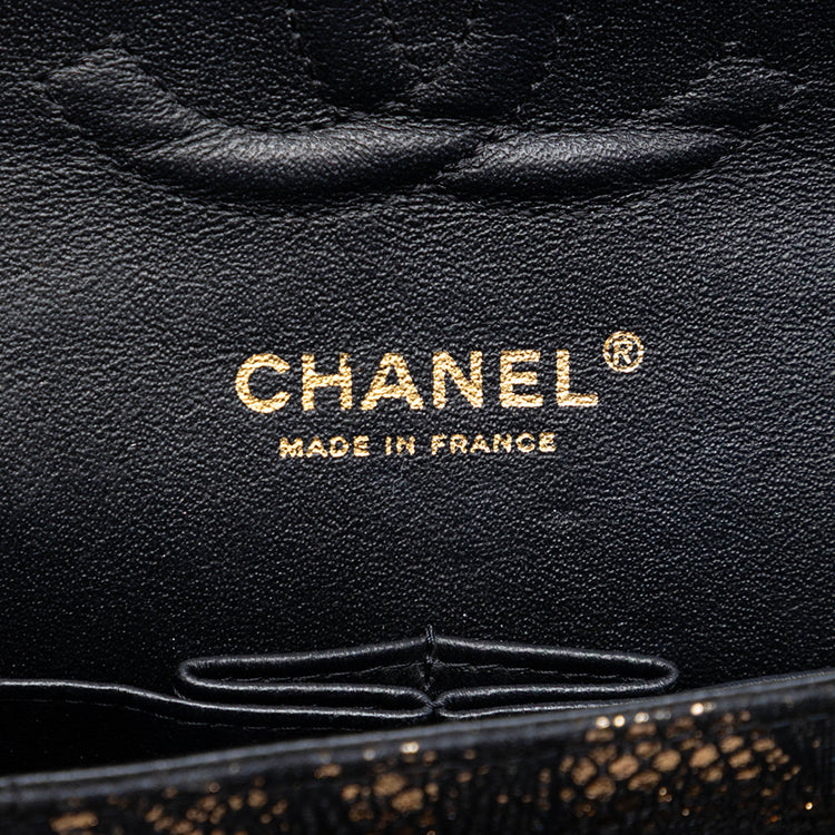Chanel medium quilted lace Chevre and lace classic double flap shoulder bag with silver hardware, detailed stitching and chain strap.