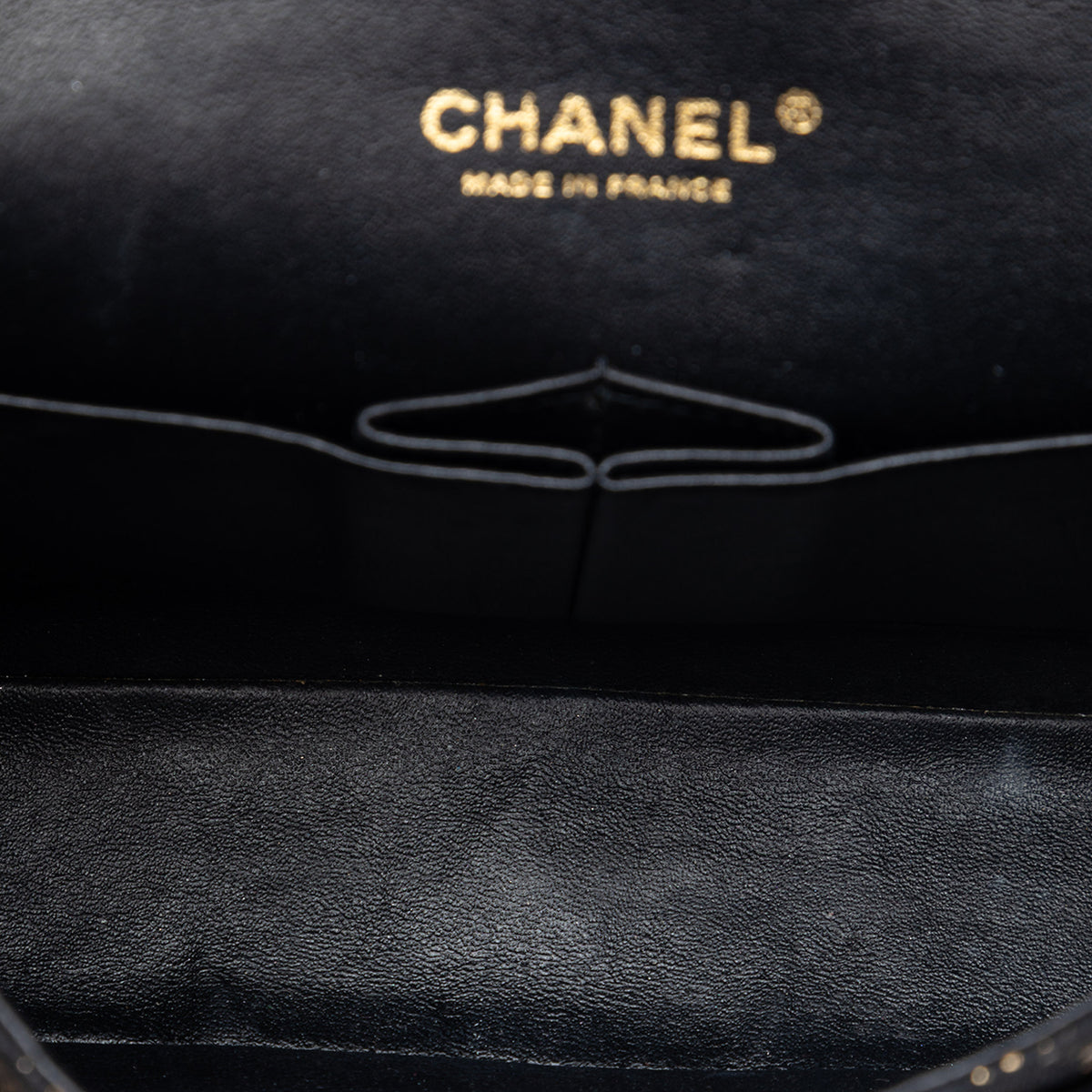 Chanel medium quilted lace chevre and lace classic double flap shoulder bag with gold-tone hardware and chain strap.