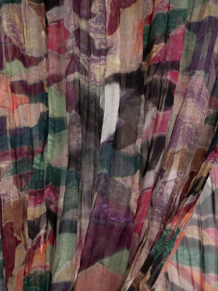 Multicolour pleated silk scarf by Chanel featuring vibrant, flowing fabric with elegant pleats and intricate design details.