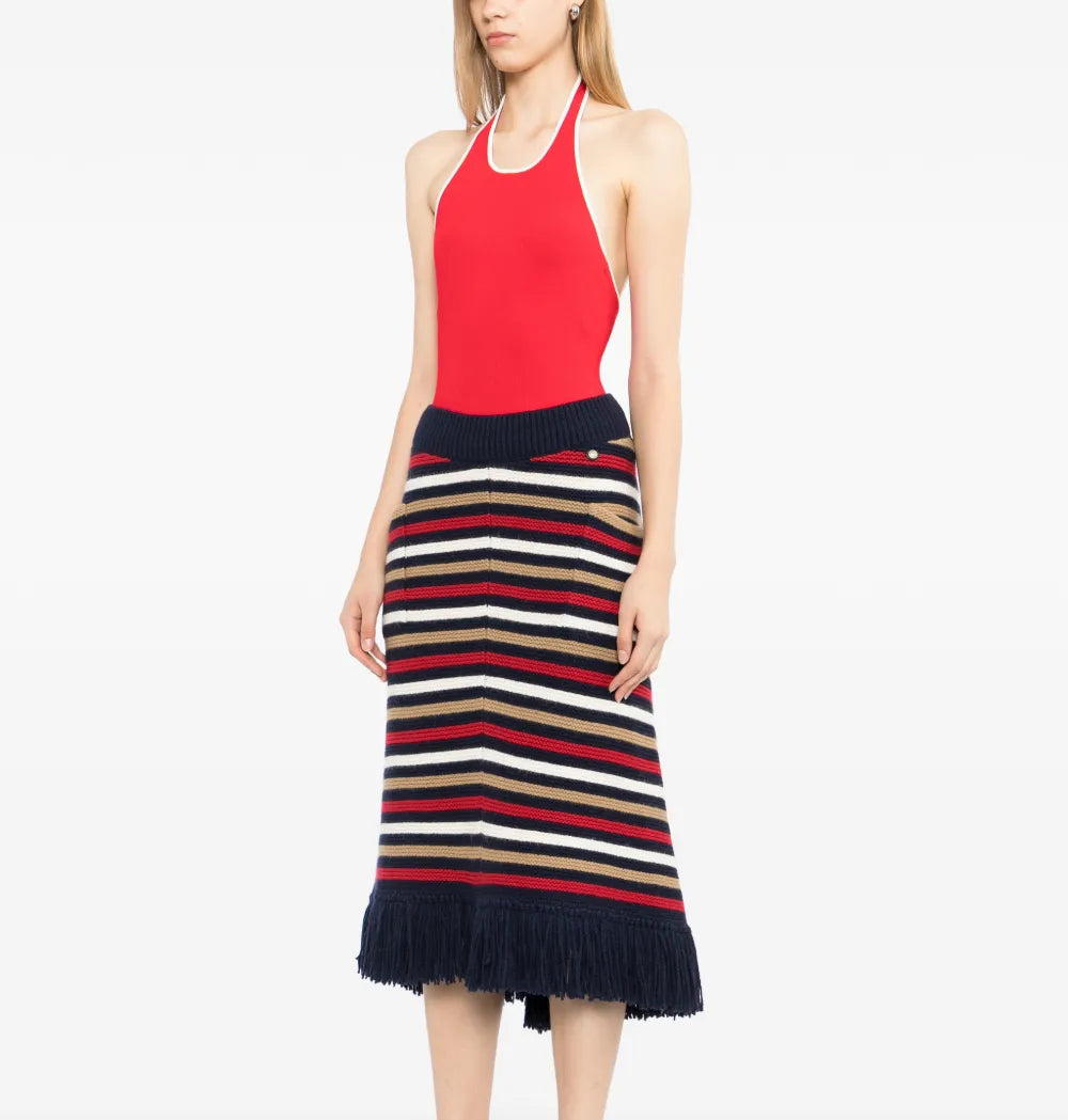 Multicolour striped knit midi skirt by Chanel featuring fringe details and a fitted waist, perfect for stylish casual wear.