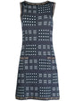 Navy and white Chanel winter knit dress with long sleeves and cozy knit texture, stylish for cold weather wear.
