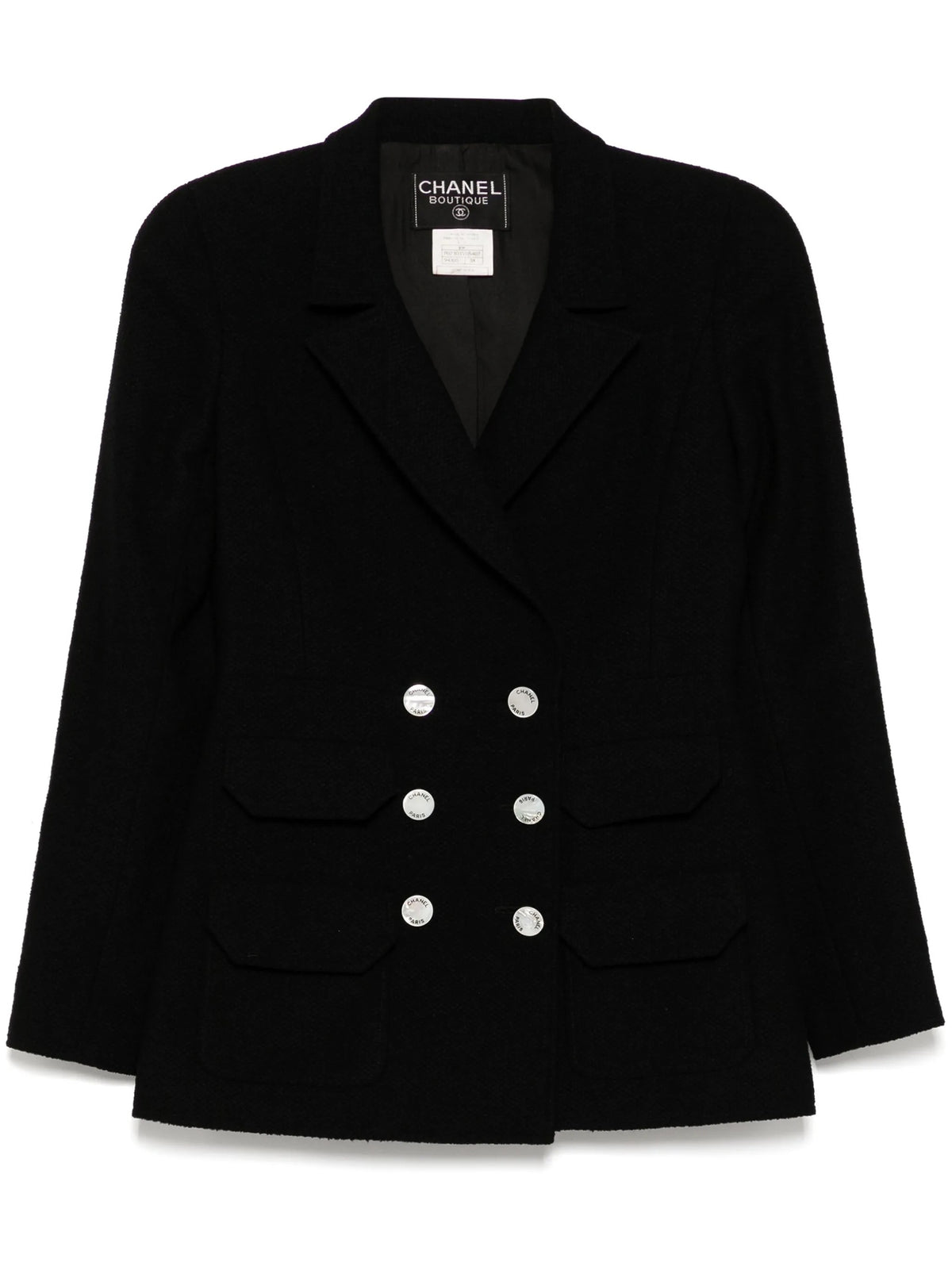 Navy double-breasted Chanel blazer with structured lapels and tailored fit, showcasing classic elegance and high-quality fabric.