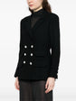 Navy double-breasted Chanel blazer with structured lapels and tailored fit, shown on a mannequin.