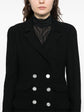 Navy double-breasted blazer by Chanel featuring tailored fit, classic lapels, and elegant design, ideal for sophisticated fashion.