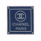 Chanel navy silk square scarf with oversized white CC logo, CHANEL PARIS lettering, geometric cream border and pink trim.