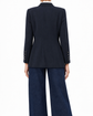 Navy layered pockets blazer by Chanel featuring tailored fit and classic style, shown on a model.