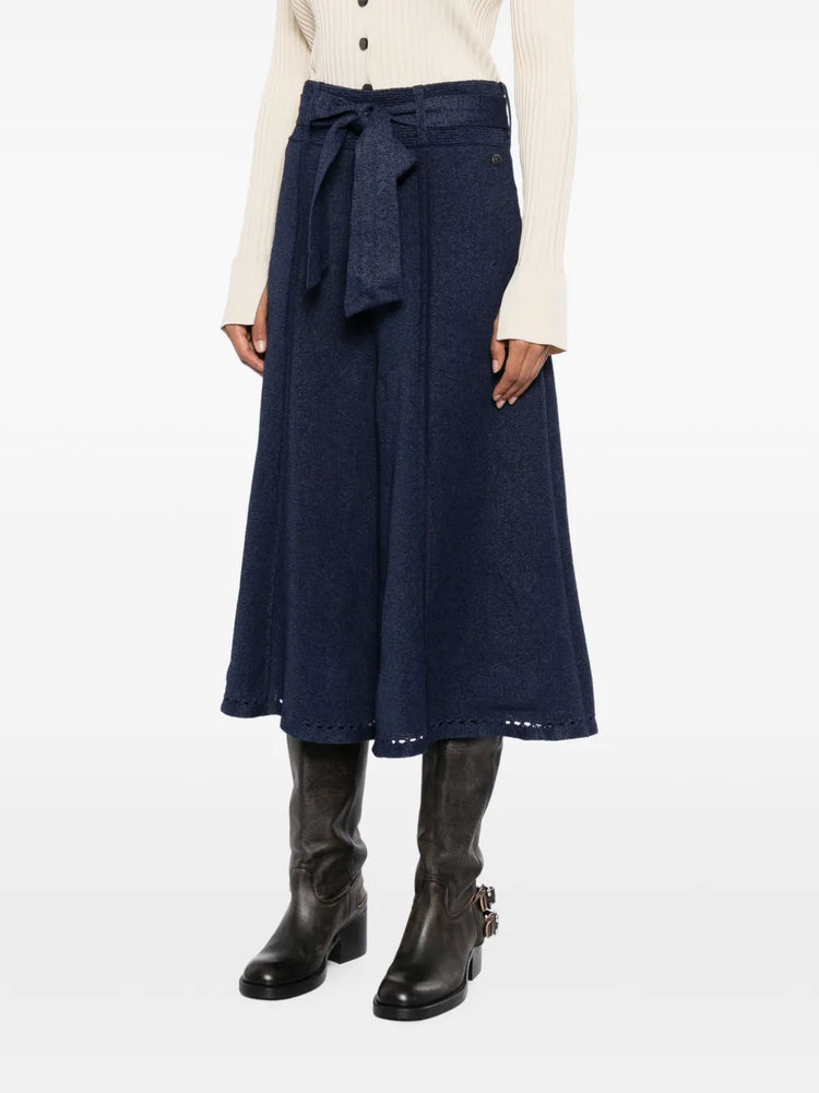 Pre-owned Chanel navy wide-leg culottes, stylish trousers with a relaxed fit, showcased on a plain background.
