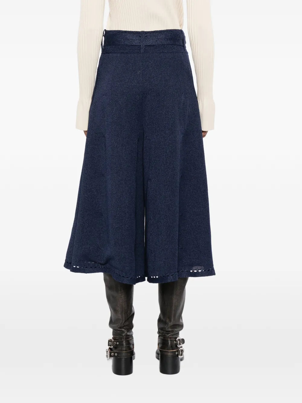 Back view of navy Chanel pre-owned wide leg culottes, stylish high-waisted trousers with flowing wide legs and tailored details.