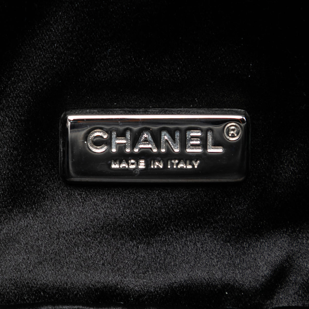 Chanel quilted lambskin butterfly clutch with chain strap, featuring a textured quilted design and elegant butterfly motif.