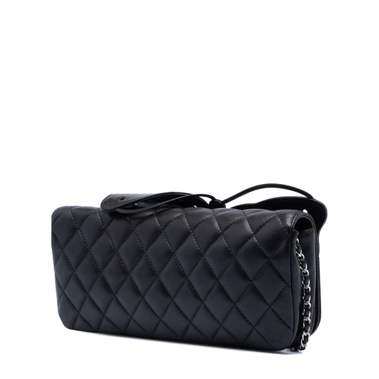 Chanel quilted lambskin butterfly clutch with chain strap, showcasing its elegant quilted design and butterfly shape from the back.
