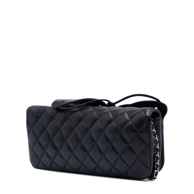 Chanel quilted lambskin butterfly clutch with chain strap, showcasing its elegant quilted design and butterfly shape from the back.