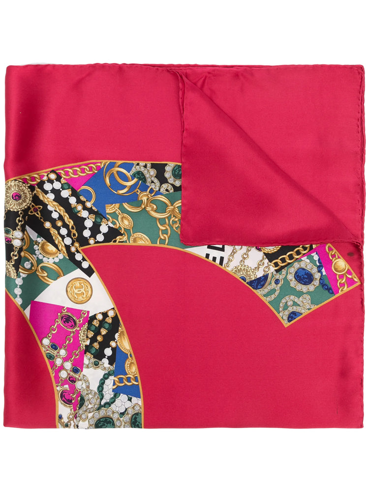 Red silk Chanel CC Jewel Print scarf featuring a square design with iconic logo and intricate jewel pattern.